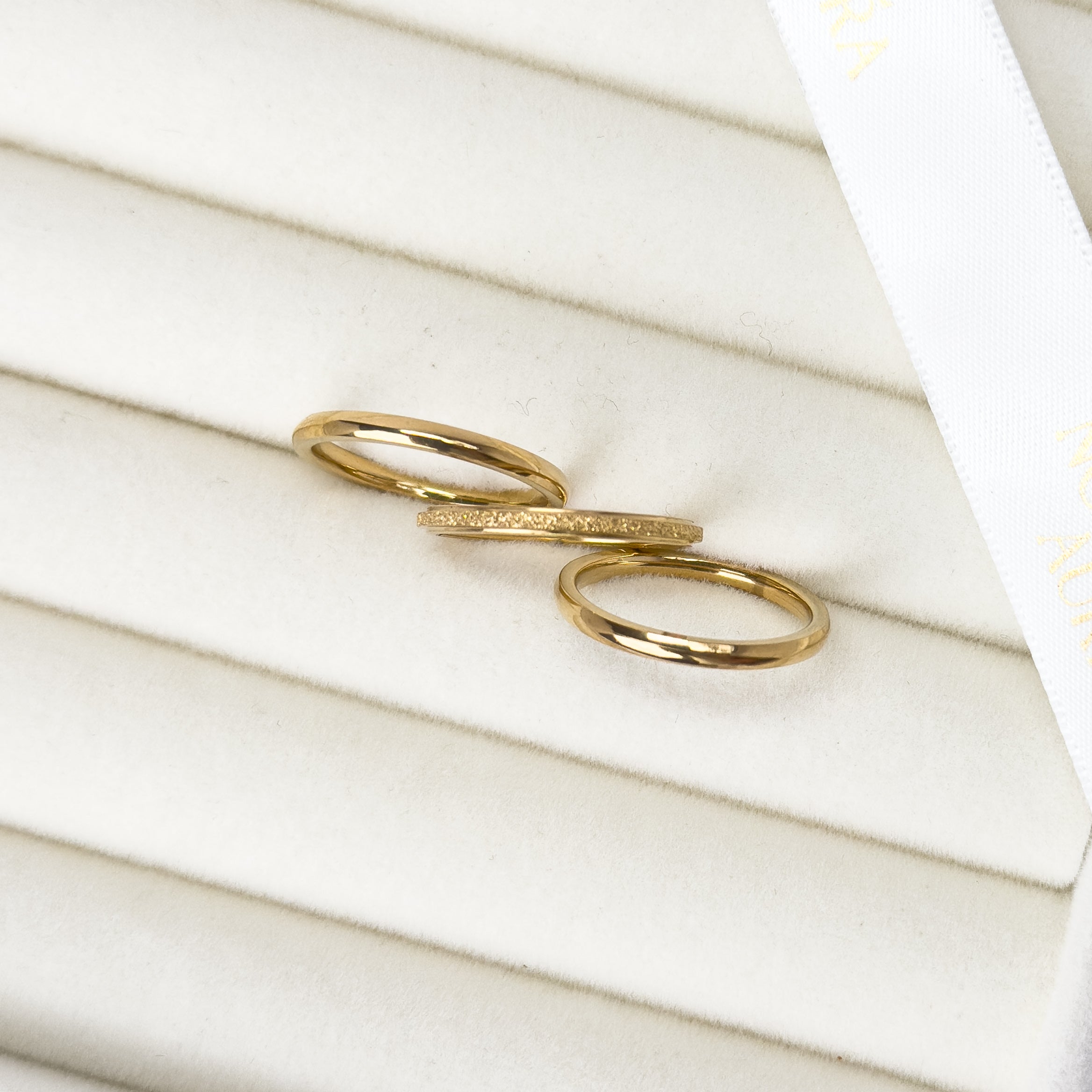 Three stack gold ring set designed for layering by Noble Aura UK