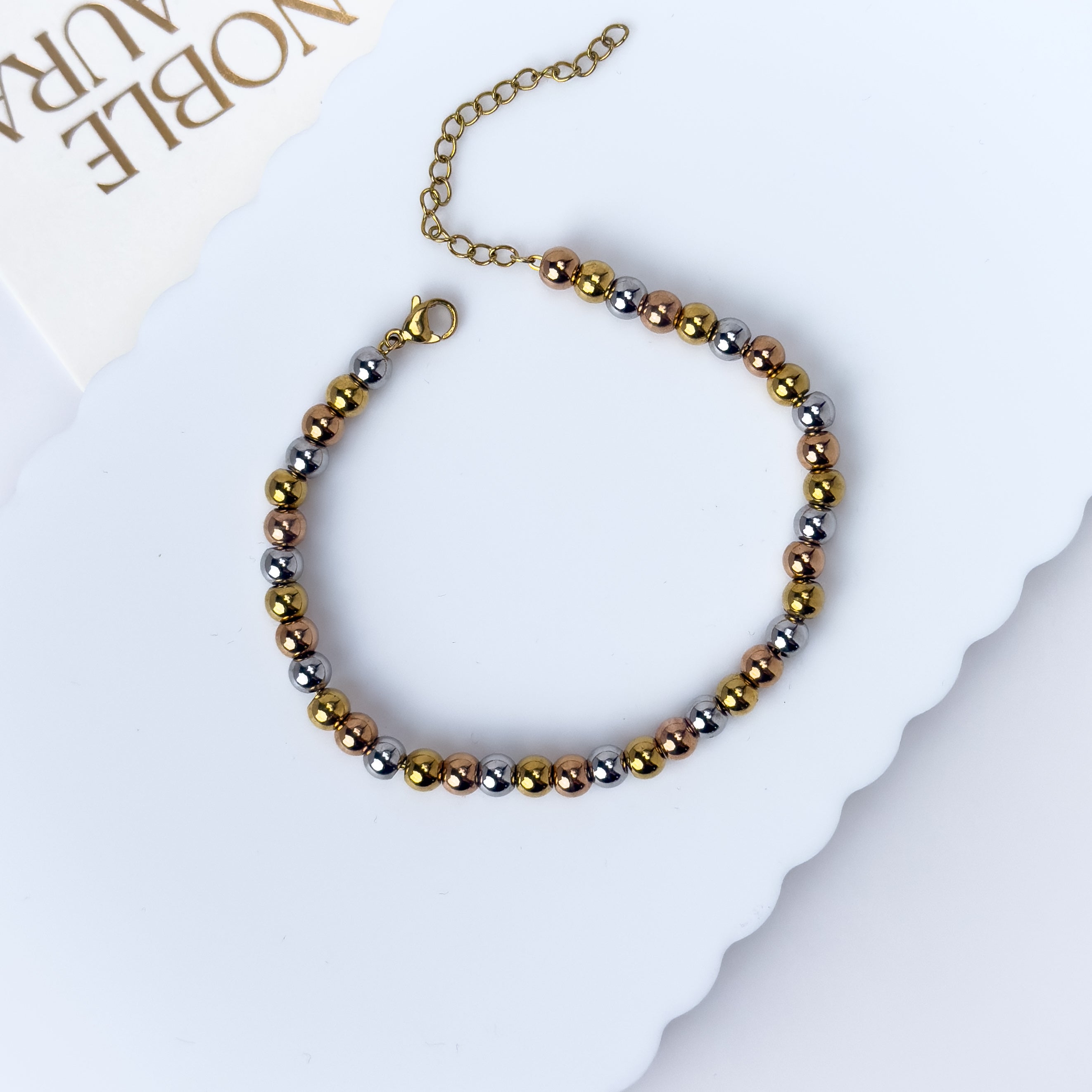 Trinity Elegance – Gold, Silver & Rose Gold Beaded Bracelet