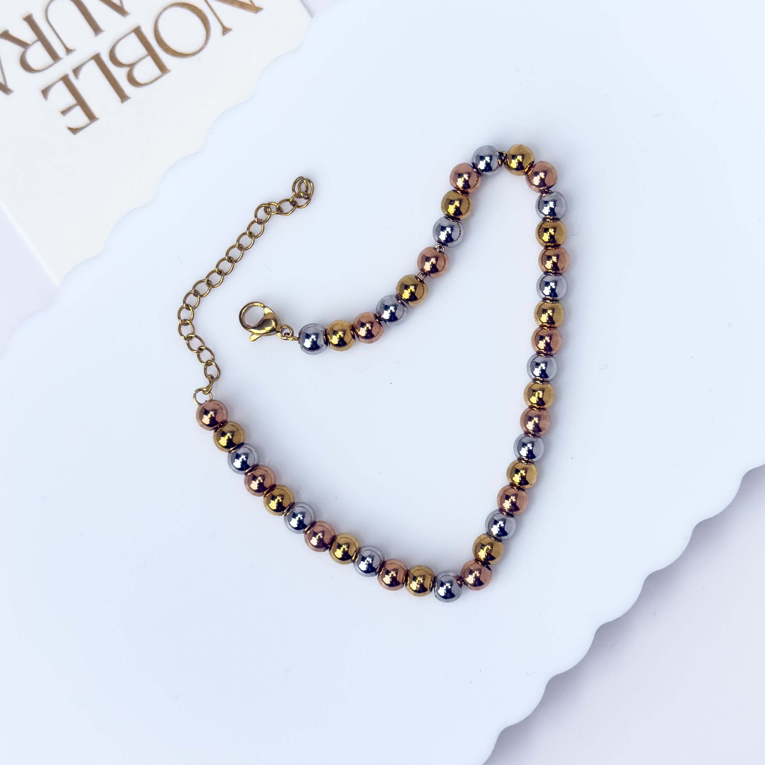 Trinity Elegance – Gold, Silver & Rose Gold Beaded Bracelet