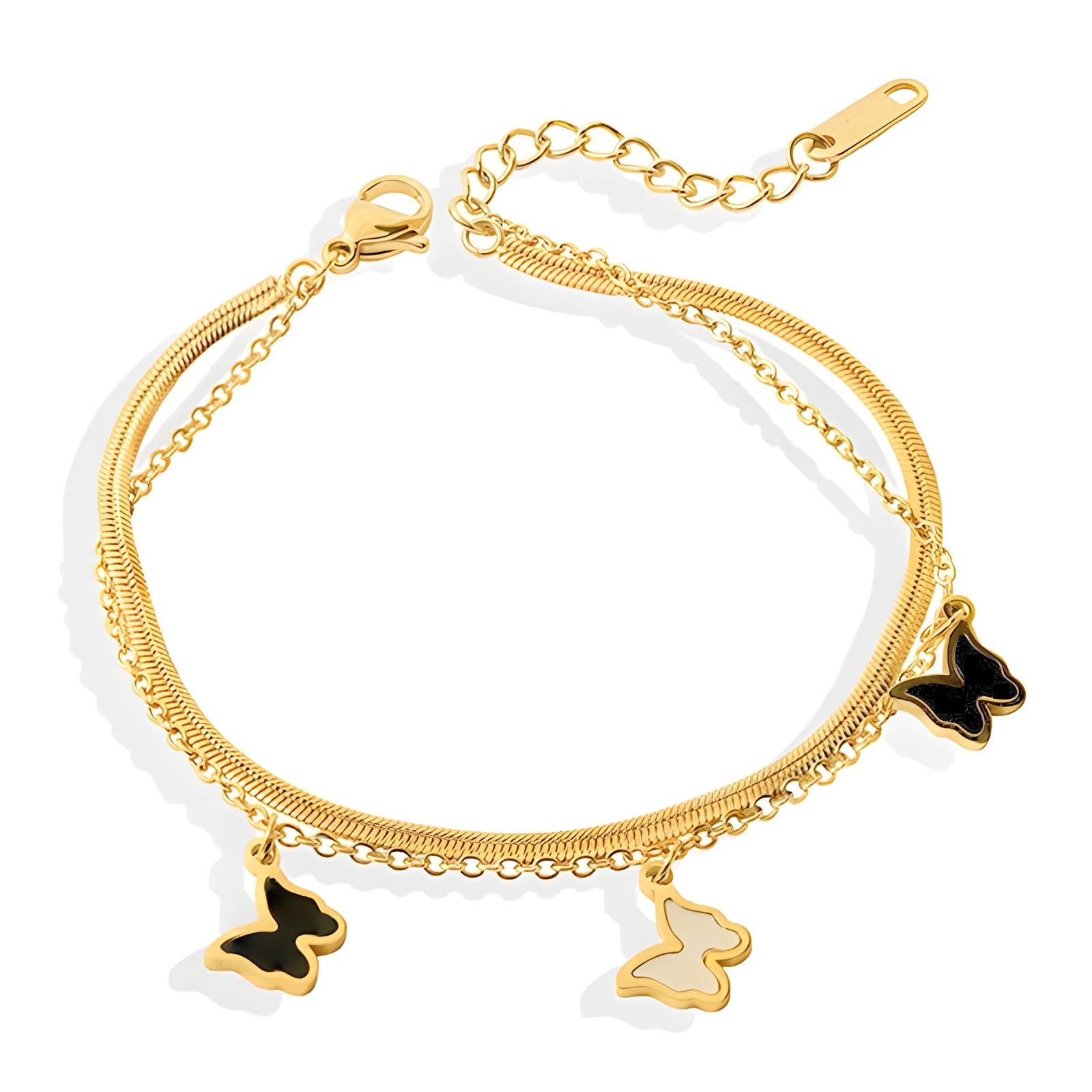 Gold butterfly charm bracelet with delicate chain by Noble Aura UK