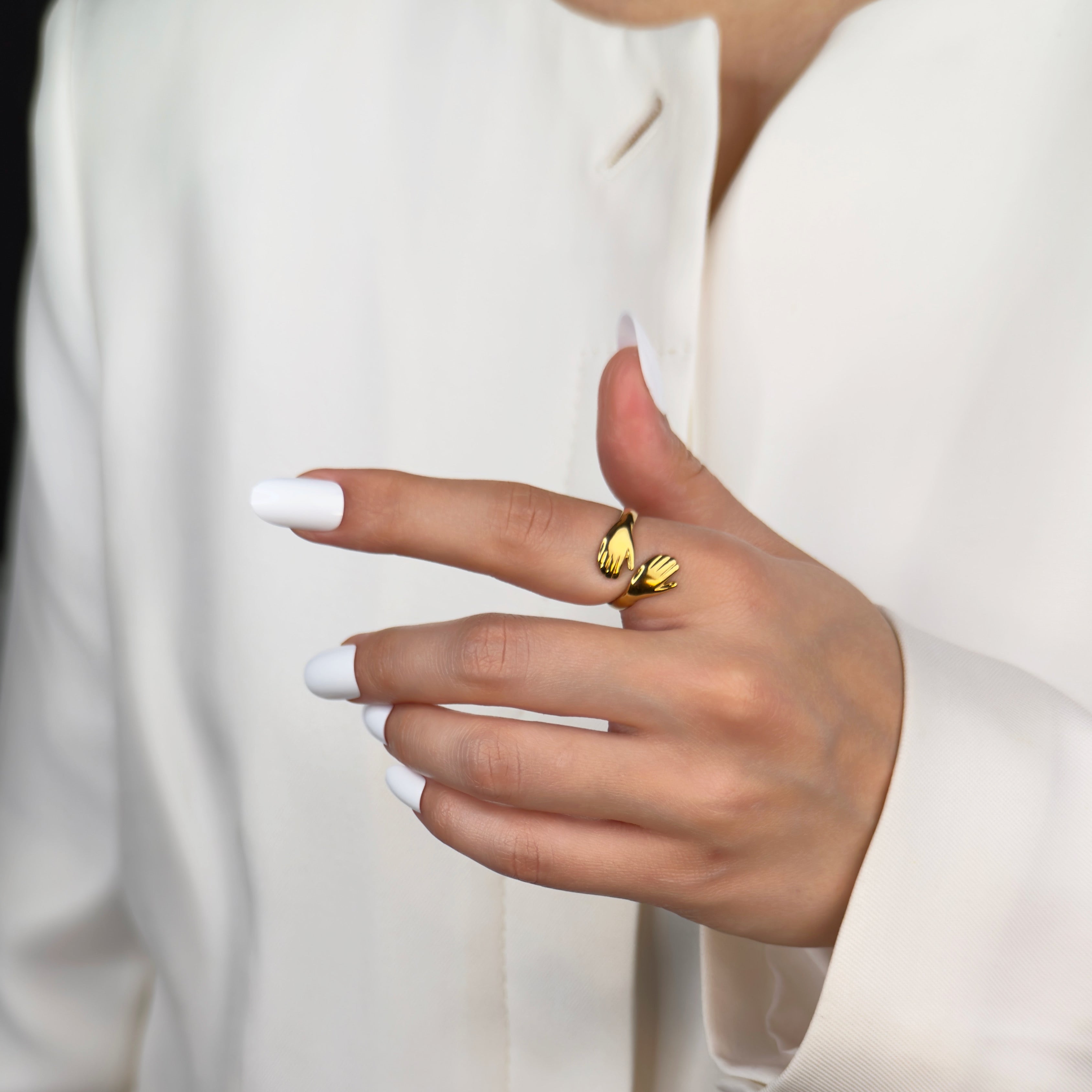 Gold angel hug adjustable ring with symbolic wrap design by Noble Aura UK