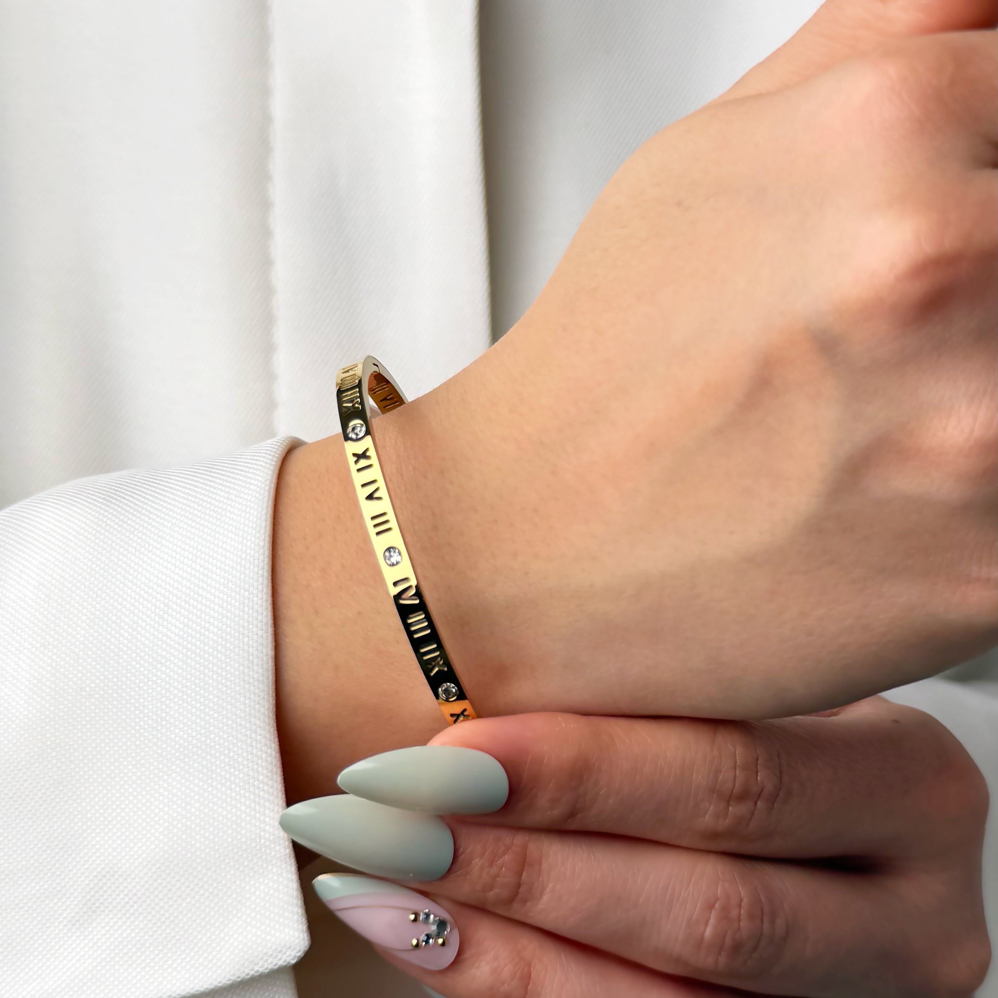 Gold Roman numeral diamond bangle bracelet by Noble Aura UK