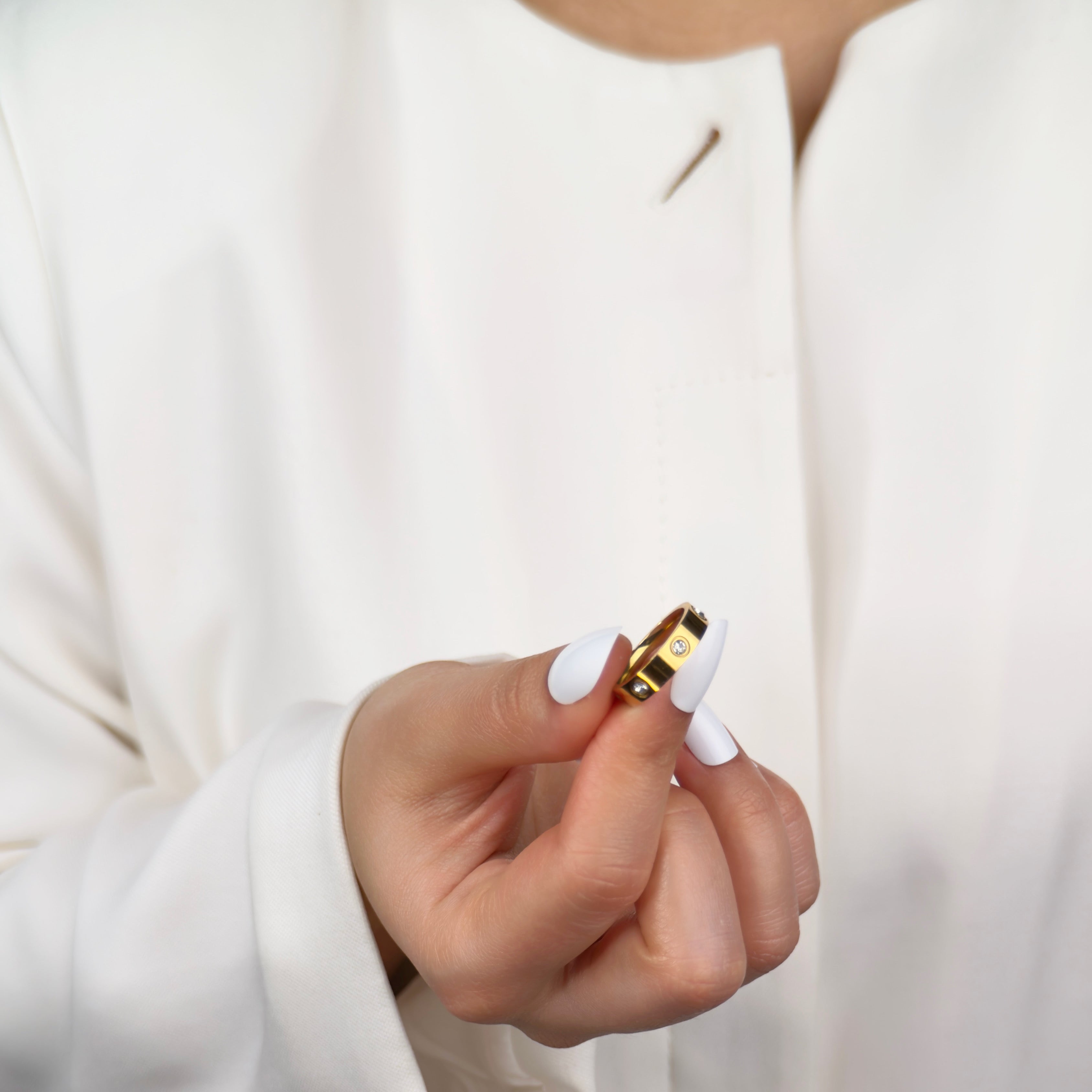 Gold bezel set band ring with minimalist stone setting by Noble Aura UK