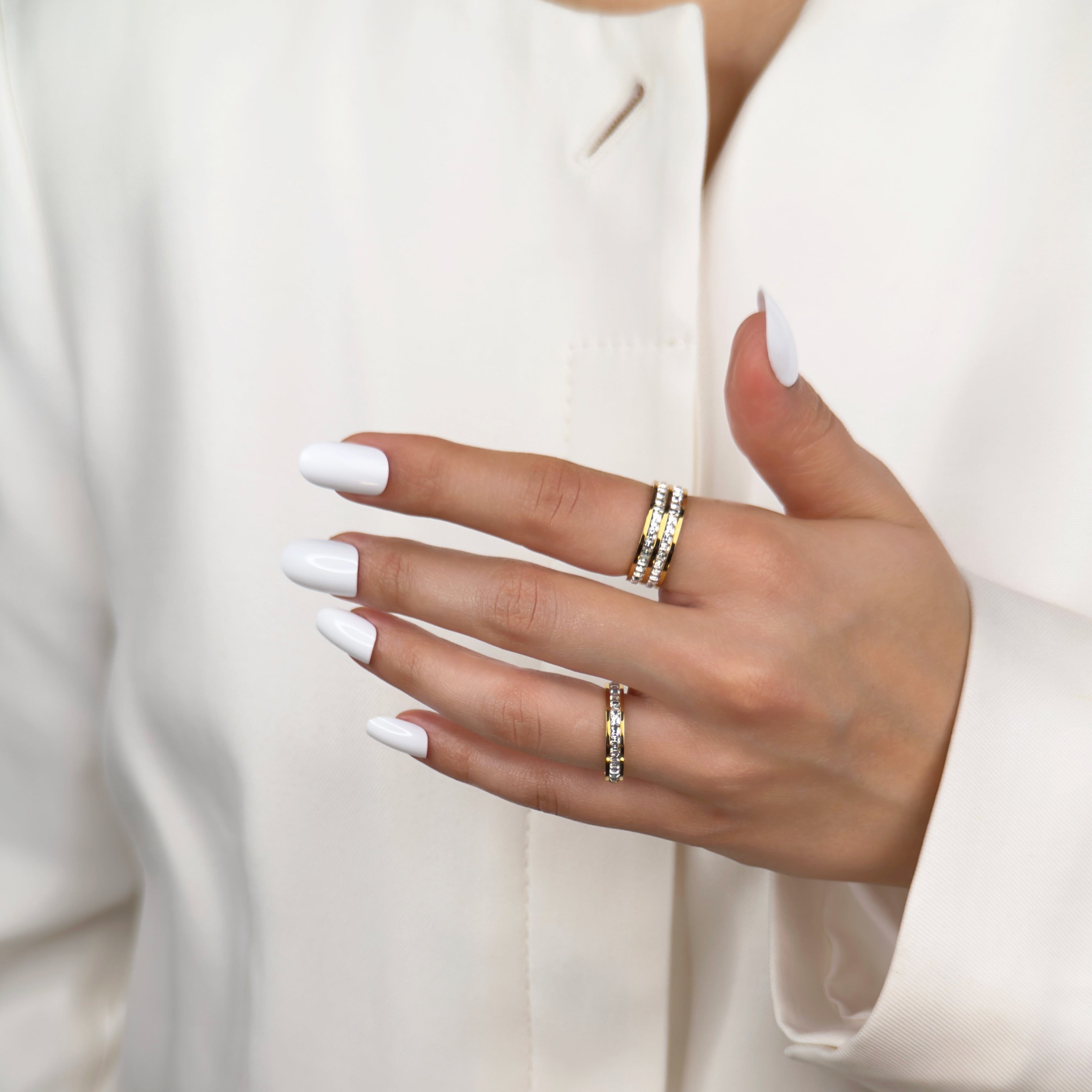 Gold eternity band ring with continuous stone detailing by Noble Aura UK