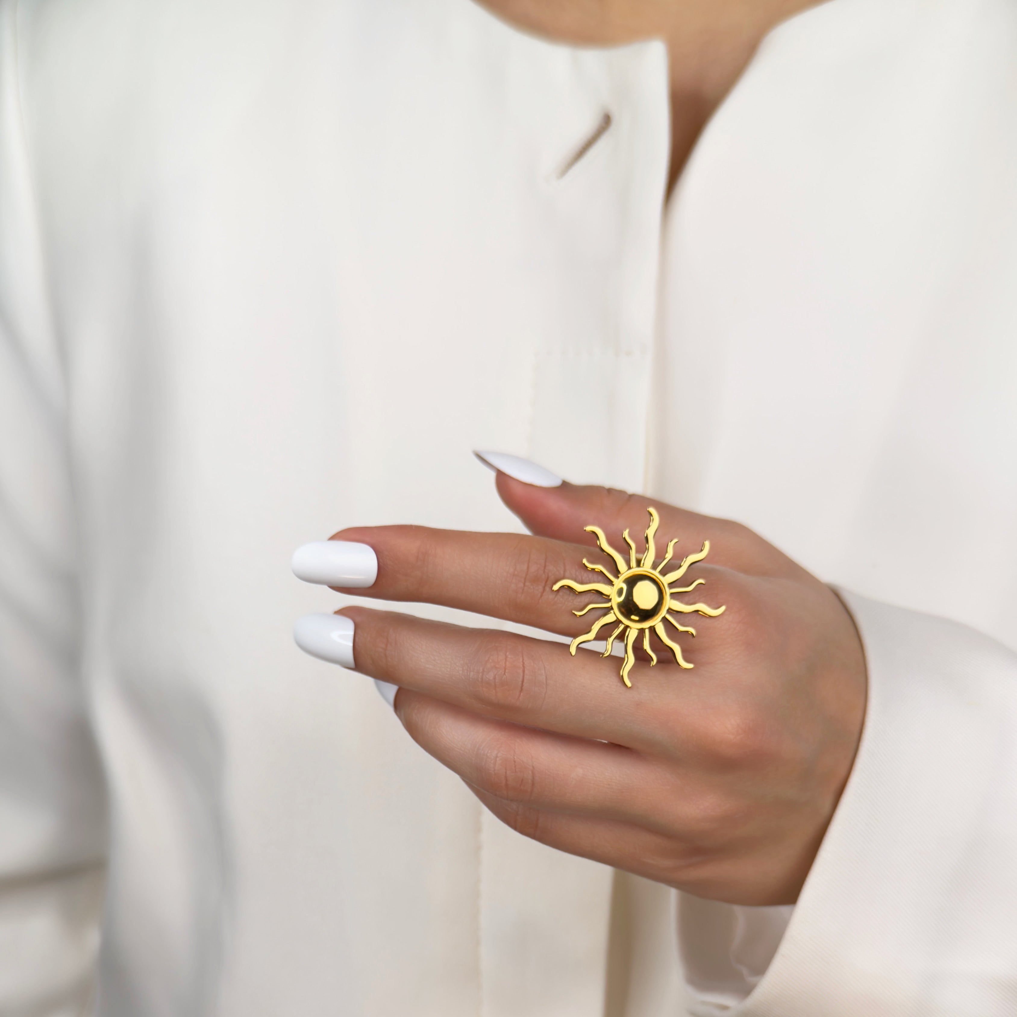 Gold sunburst adjustable ring with radiant detailing by Noble Aura UK