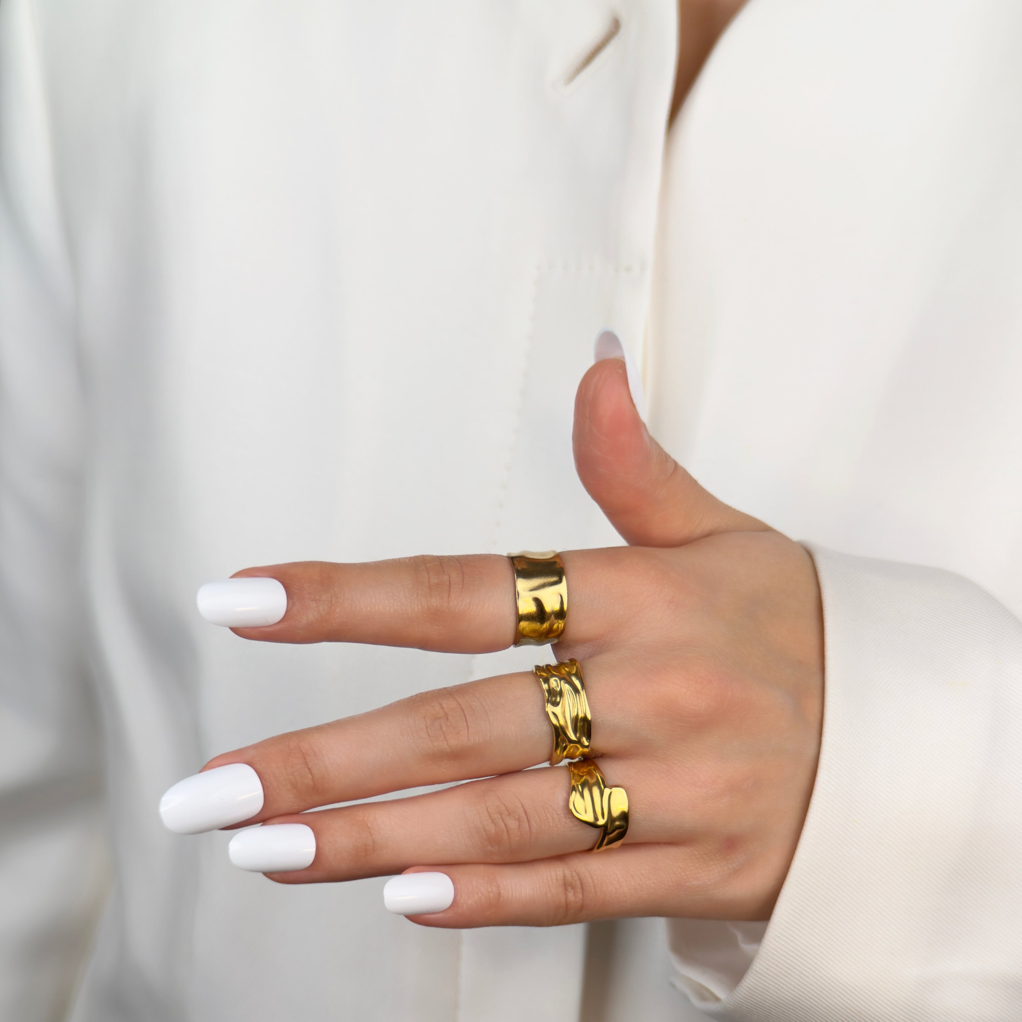 Chunky gold hammered band ring with bold finish by Noble Aura UK