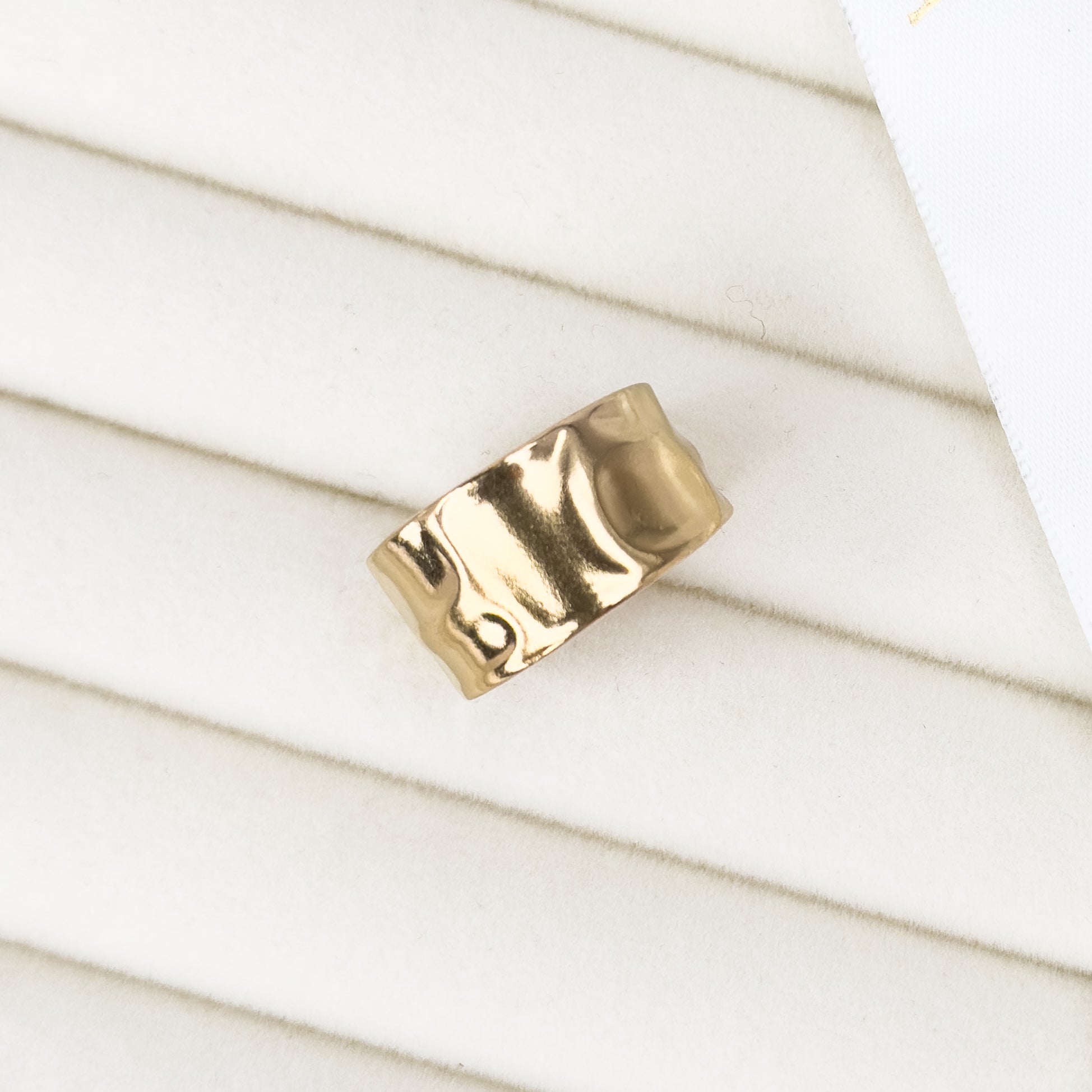 Chunky gold hammered band ring with bold finish by Noble Aura UK
