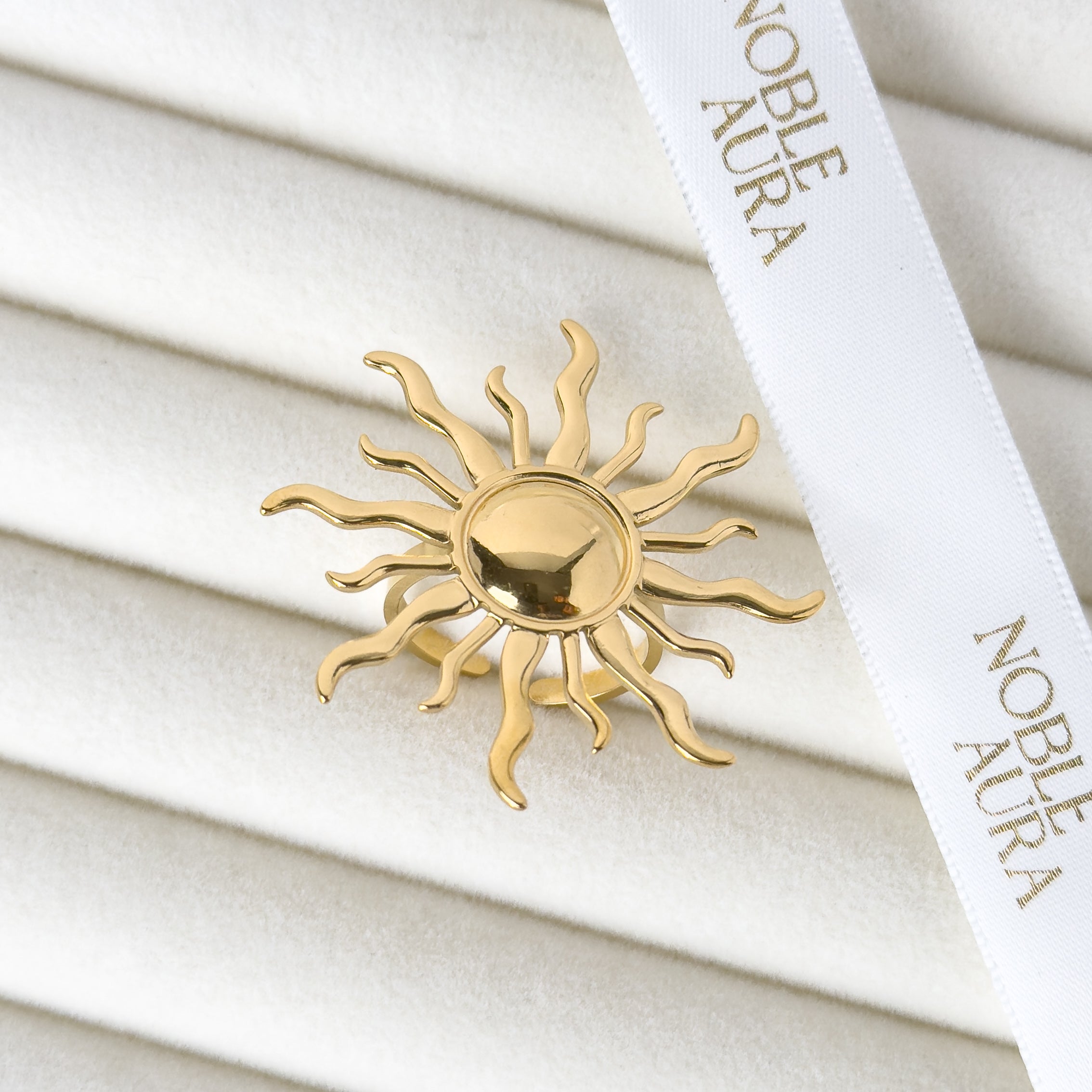 Gold sunburst adjustable ring with radiant detailing by Noble Aura UK
