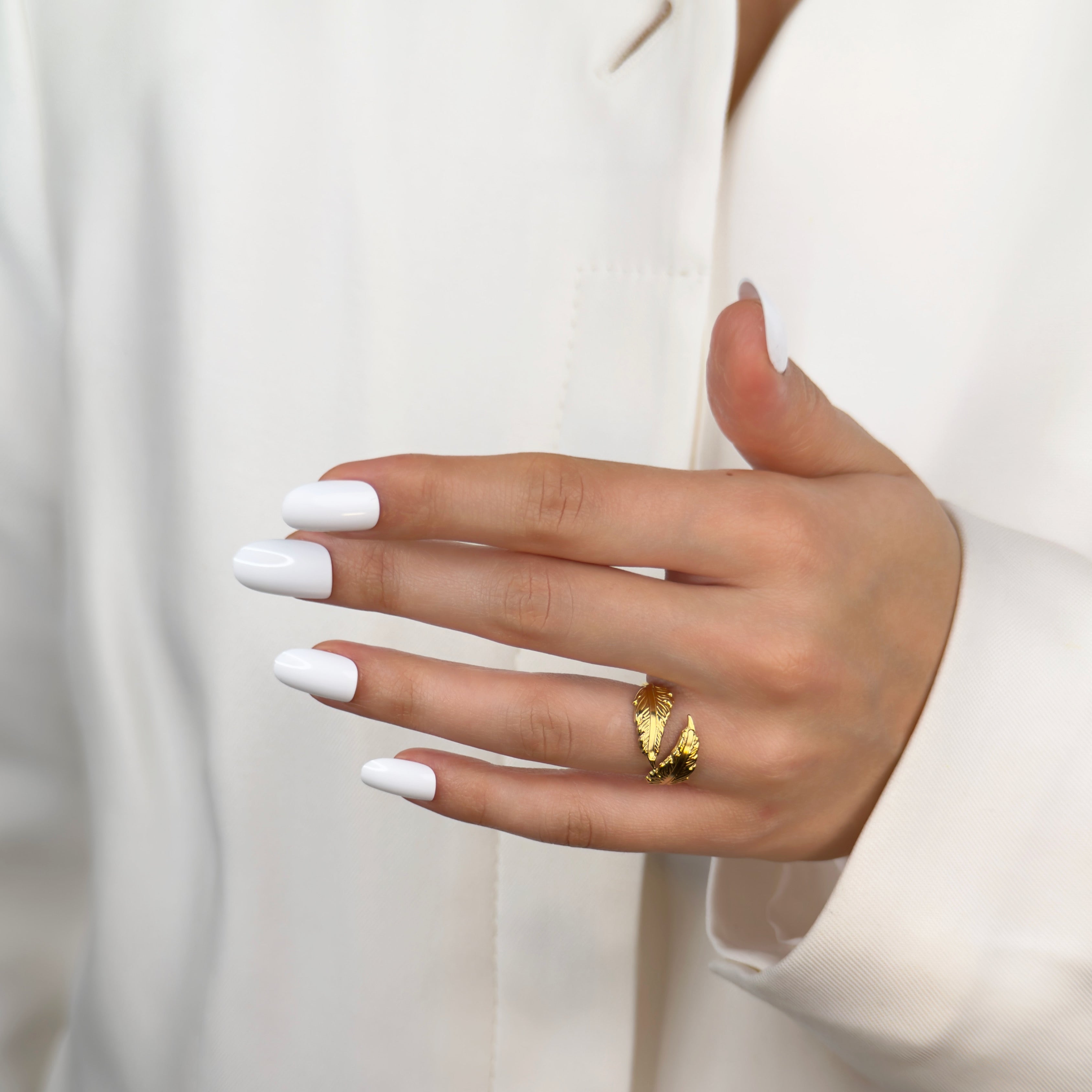 Gold adjustable ring with angel feather wrap design by Noble Aura UK. Fits most ring sizes. 