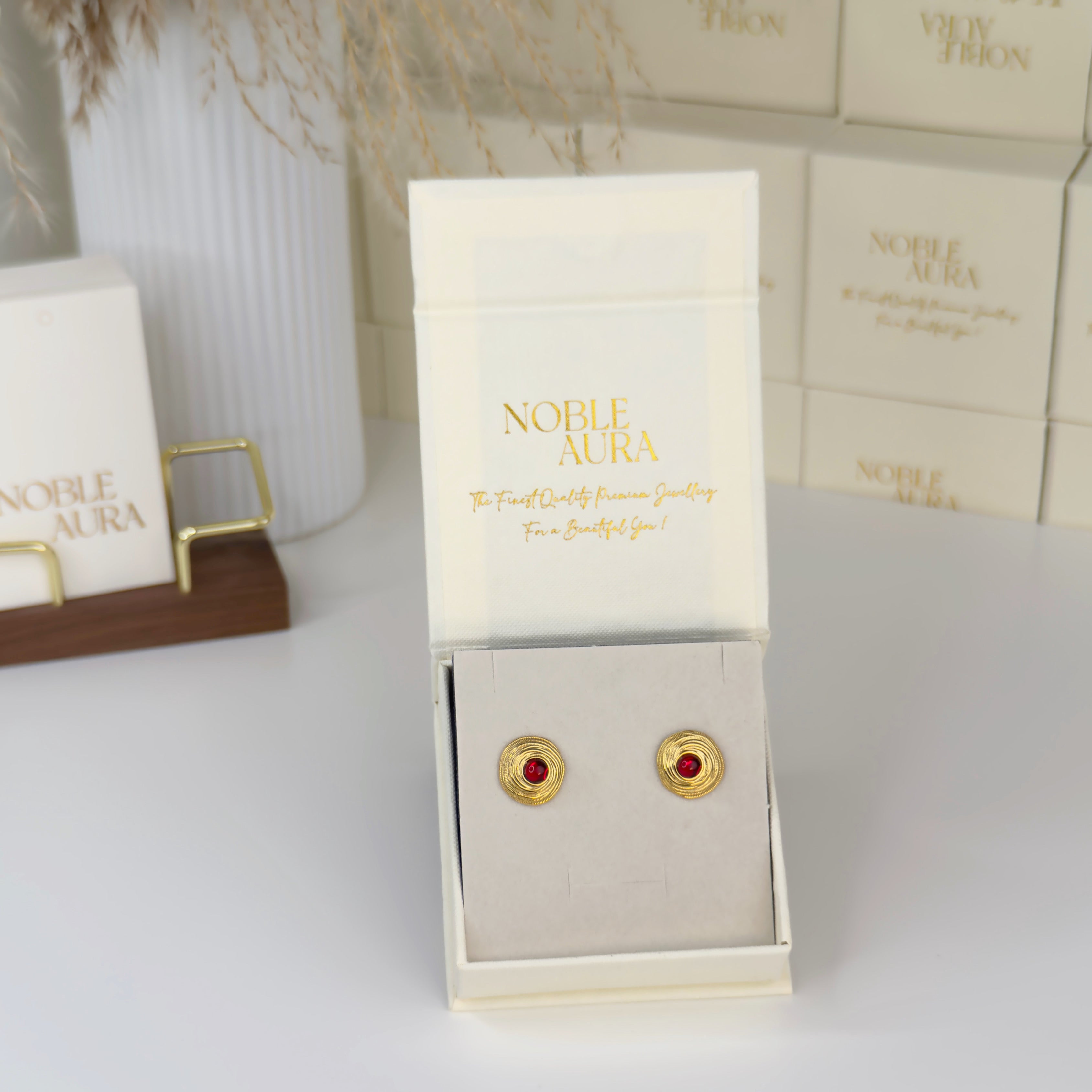 Baroque style gold stud earrings with red gemstone by Noble Aura UK