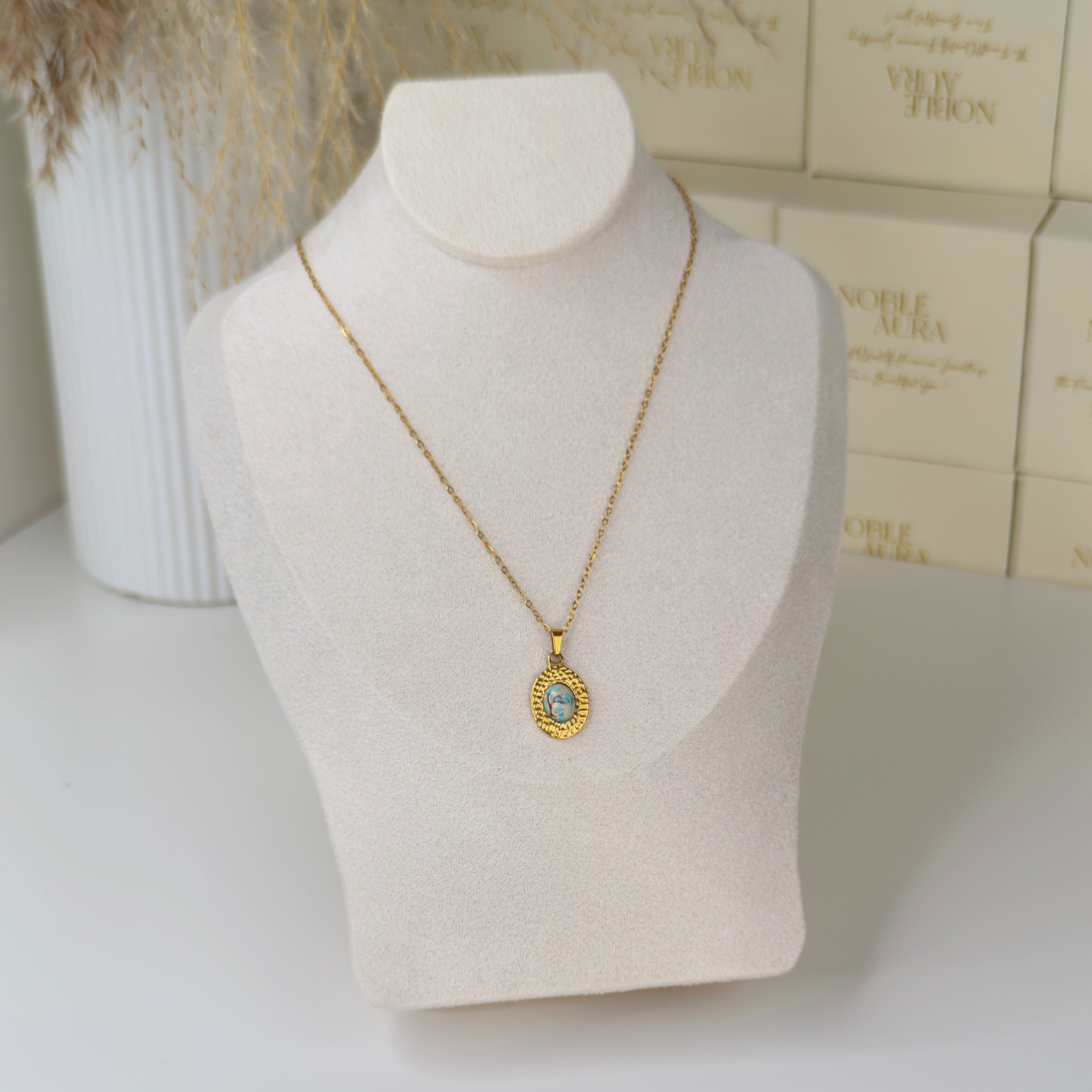 Gold boho style pendant necklace with abstract blue stone by Noble Aura UK
Comes in Premium packaging. Free Delivery over £50.