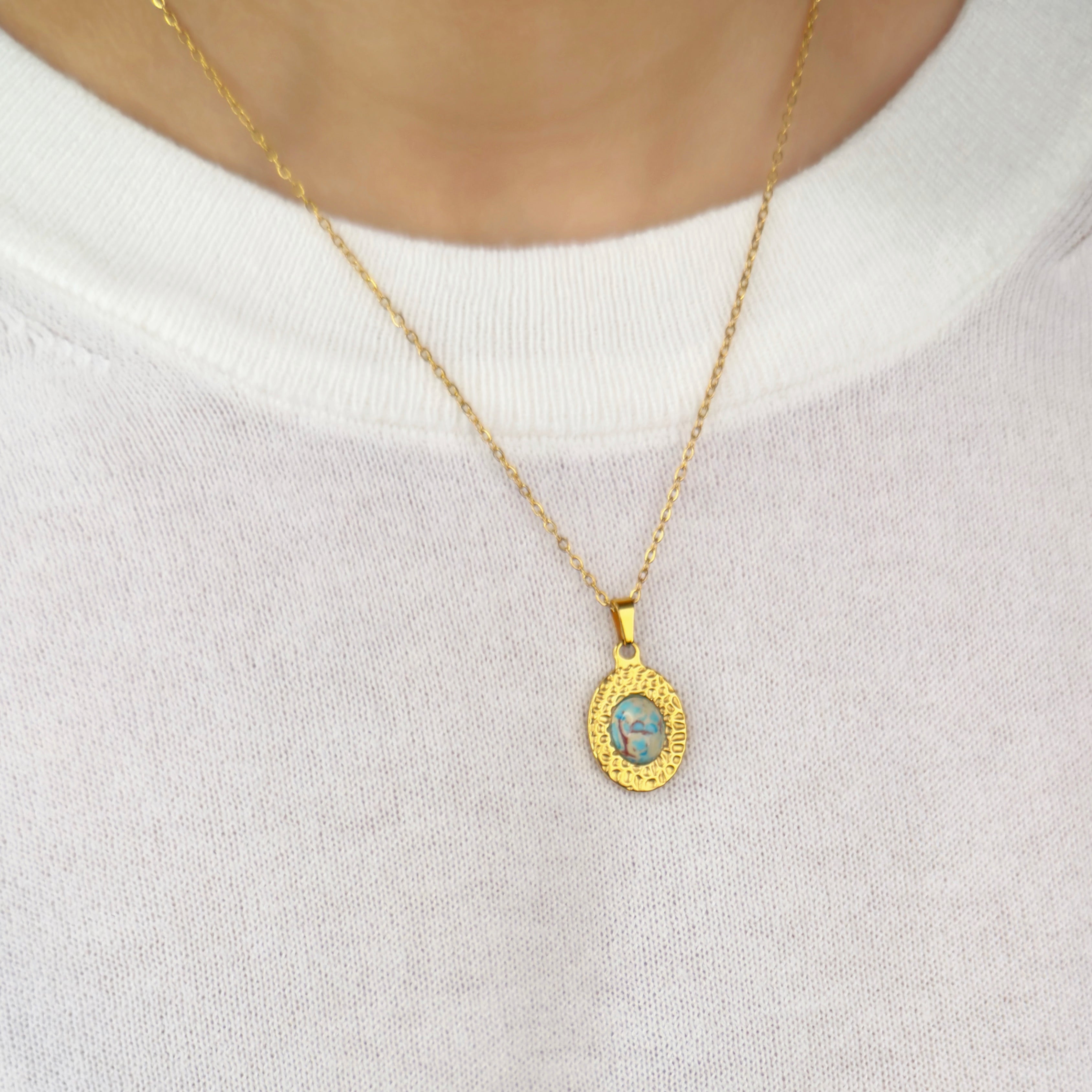 Gold boho style pendant necklace with abstract blue stone by Noble Aura UK
Comes in Premium packaging. Free Delivery over £50.
