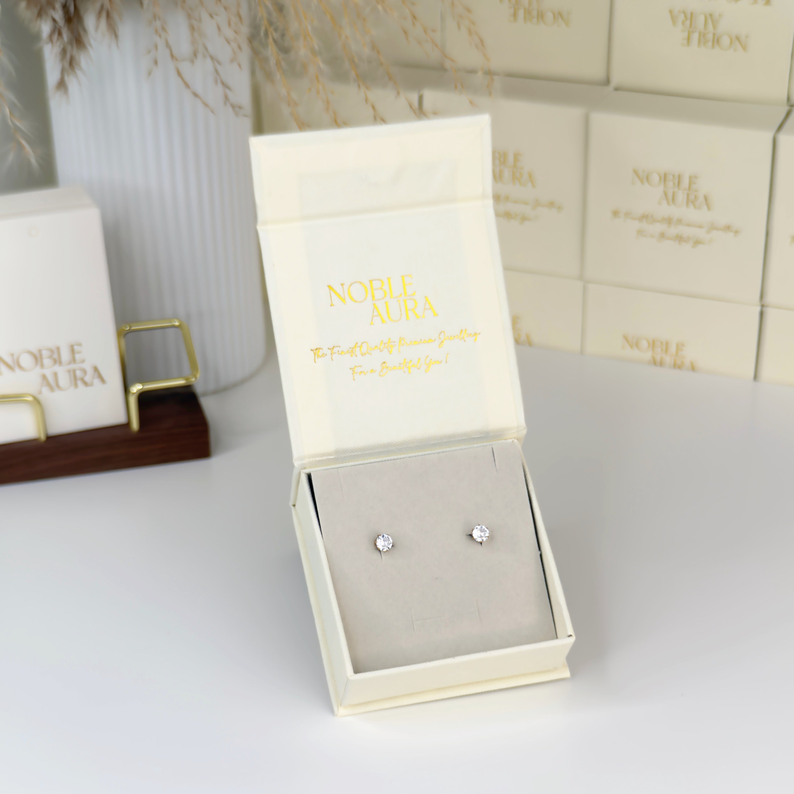 Classic gold diamond style stud earrings by Noble Aura UK