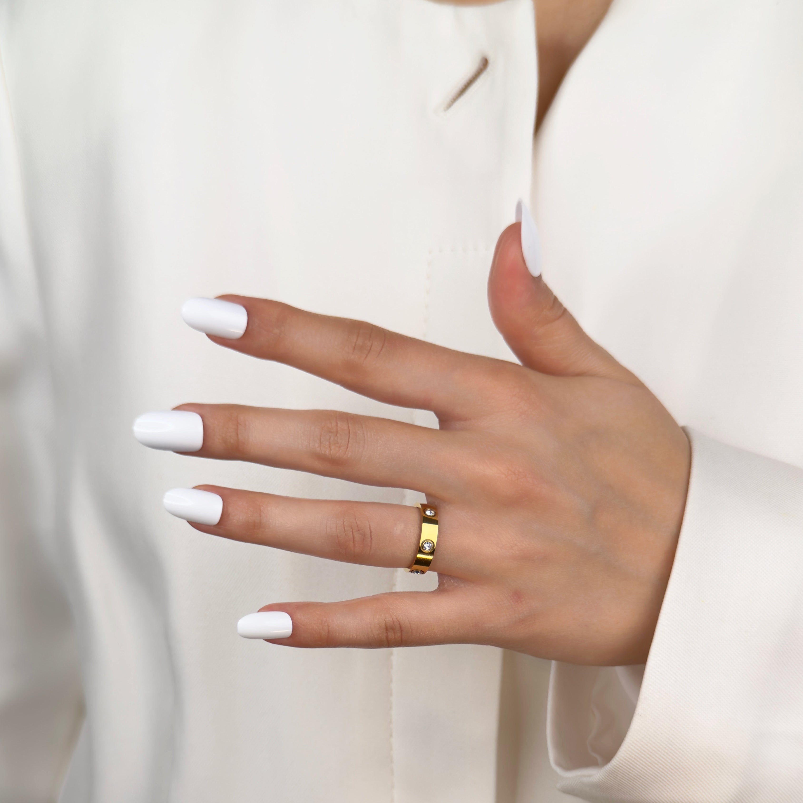Gold bezel set band ring with minimalist stone setting by Noble Aura UK

