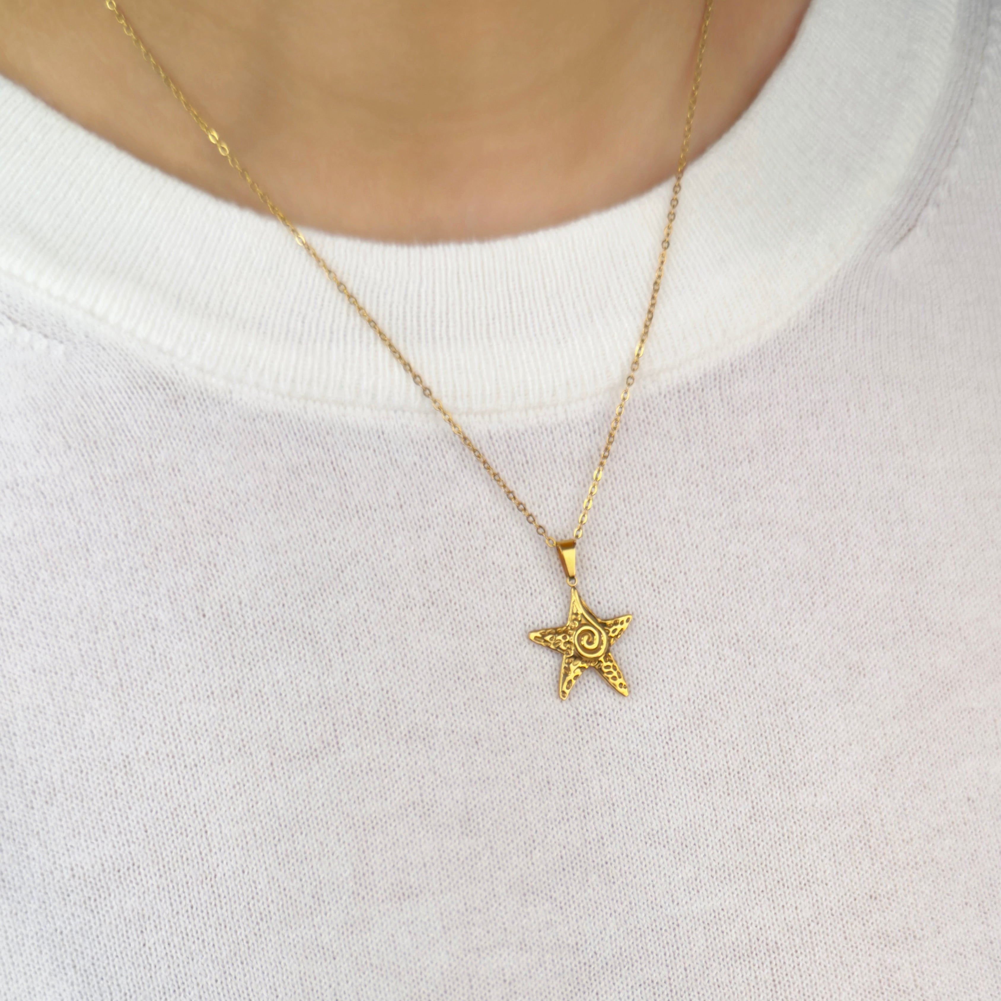 Gold starfish pendant necklace inspired by coastal elegance by Noble Aura UK
Comes in Premium packaging. Free Delivery over £50.
