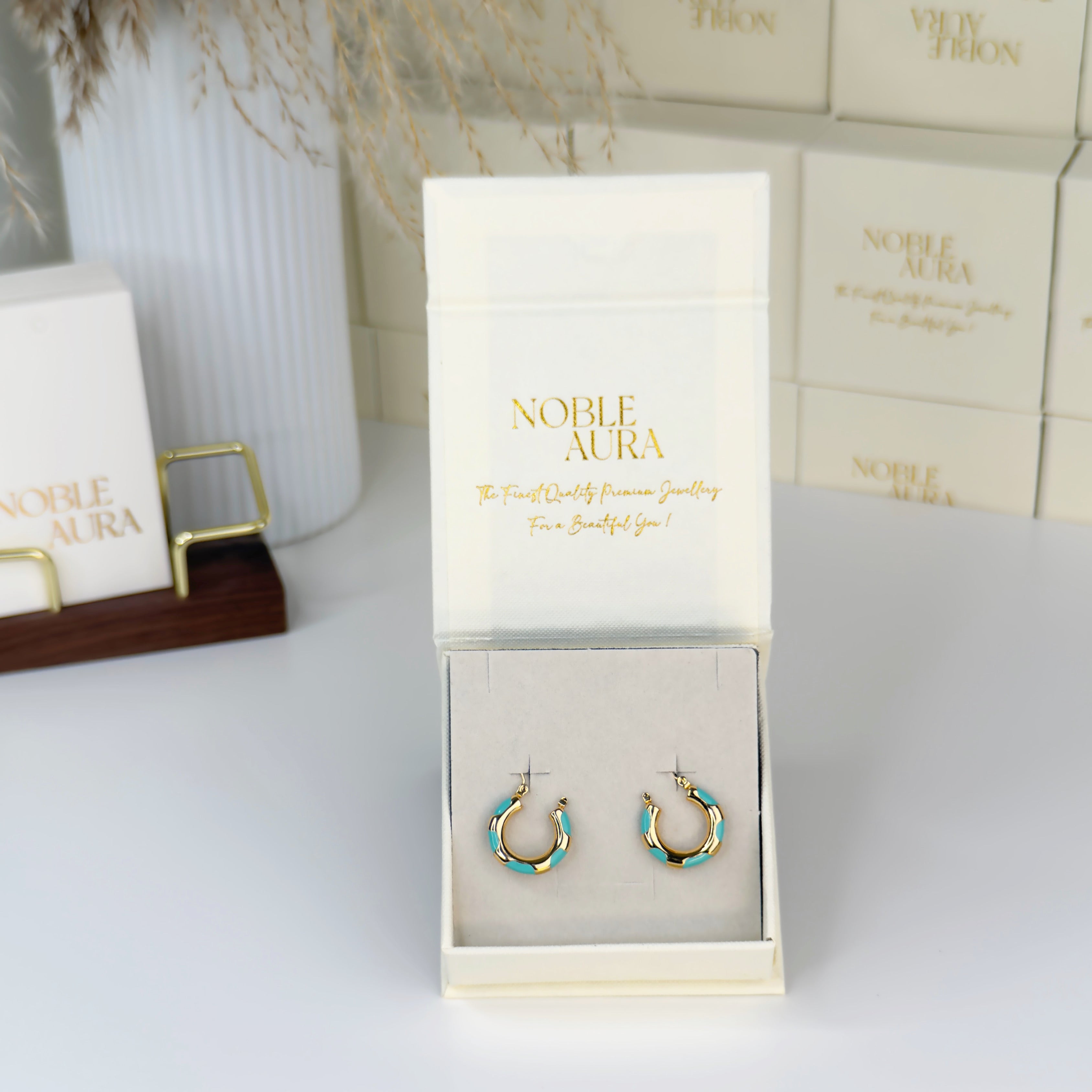 Gold hoop earrings with turquoise stone detailing by Noble Aura UK affordable jewellery gift wrapped in luxury 