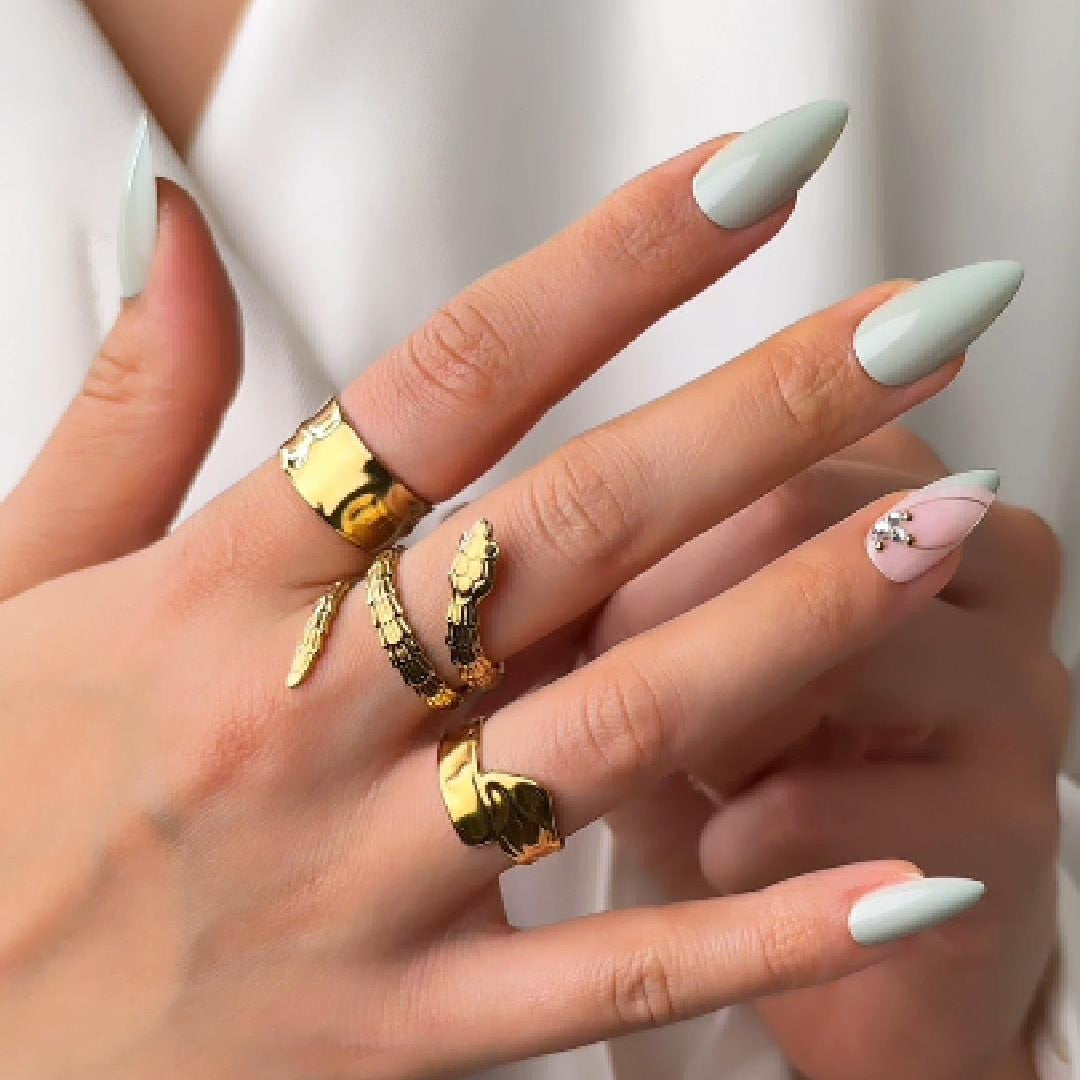 Gold snake wrap adjustable ring with sleek coiled design by Noble Aura UK
